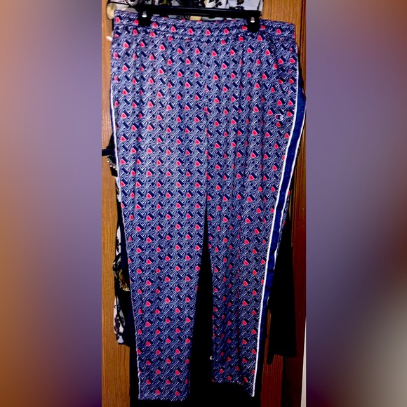 Women’s XL Champion track suit. It’s blue with champion logo all over. - Picture 2 of 2